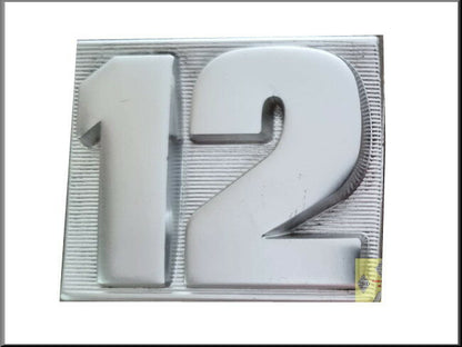 Embleem "12" voorscherm – Renault 12 – OEM 7700517693