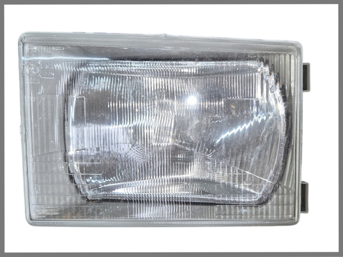 Headlight front left RHD - Renault Trafic - OEM 7701025786